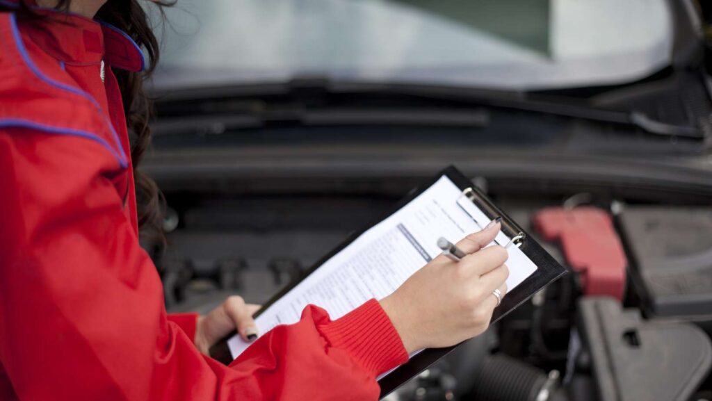 car inspection by young girl